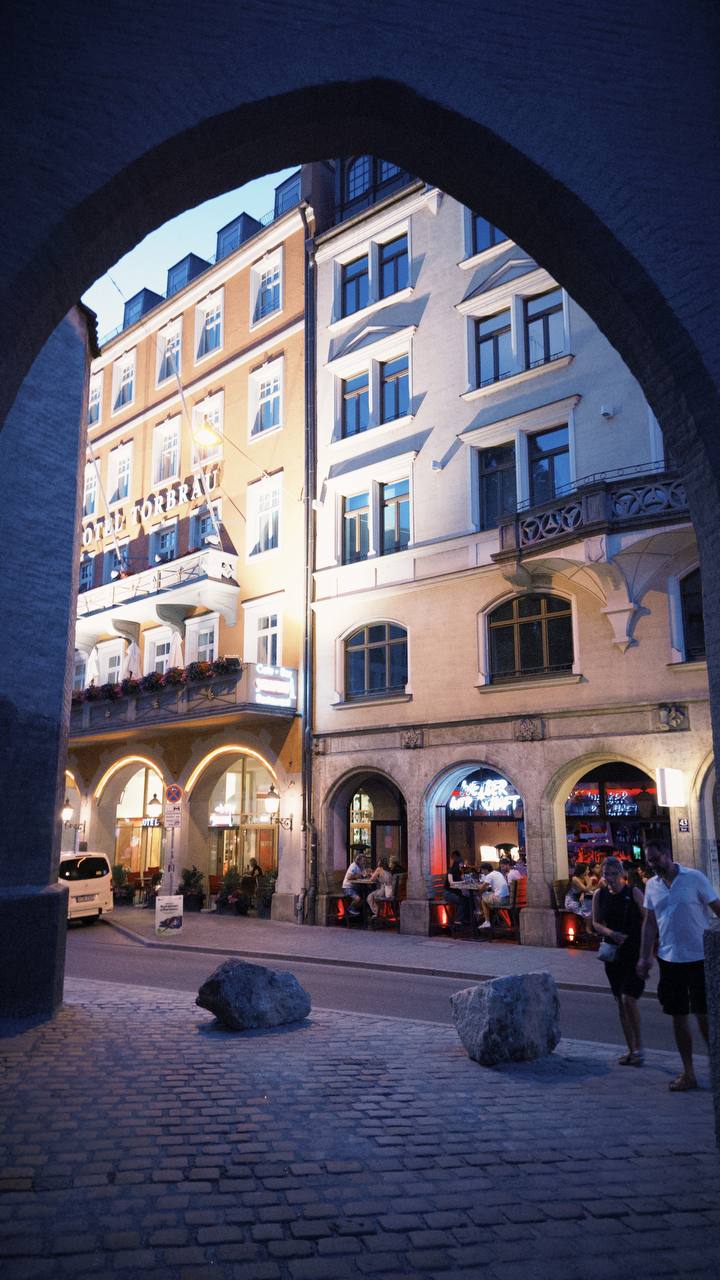 Scenes from Munich Old Town, including historic streets, squares, landmarks, and everyday city moments.