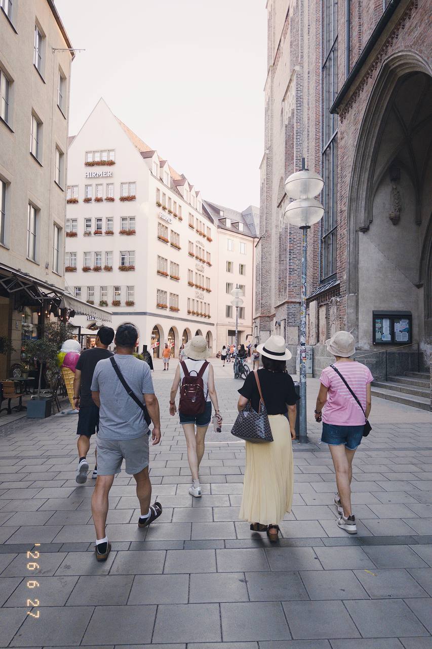 Scenes from Munich Old Town, including historic streets, squares, landmarks, and everyday city moments.