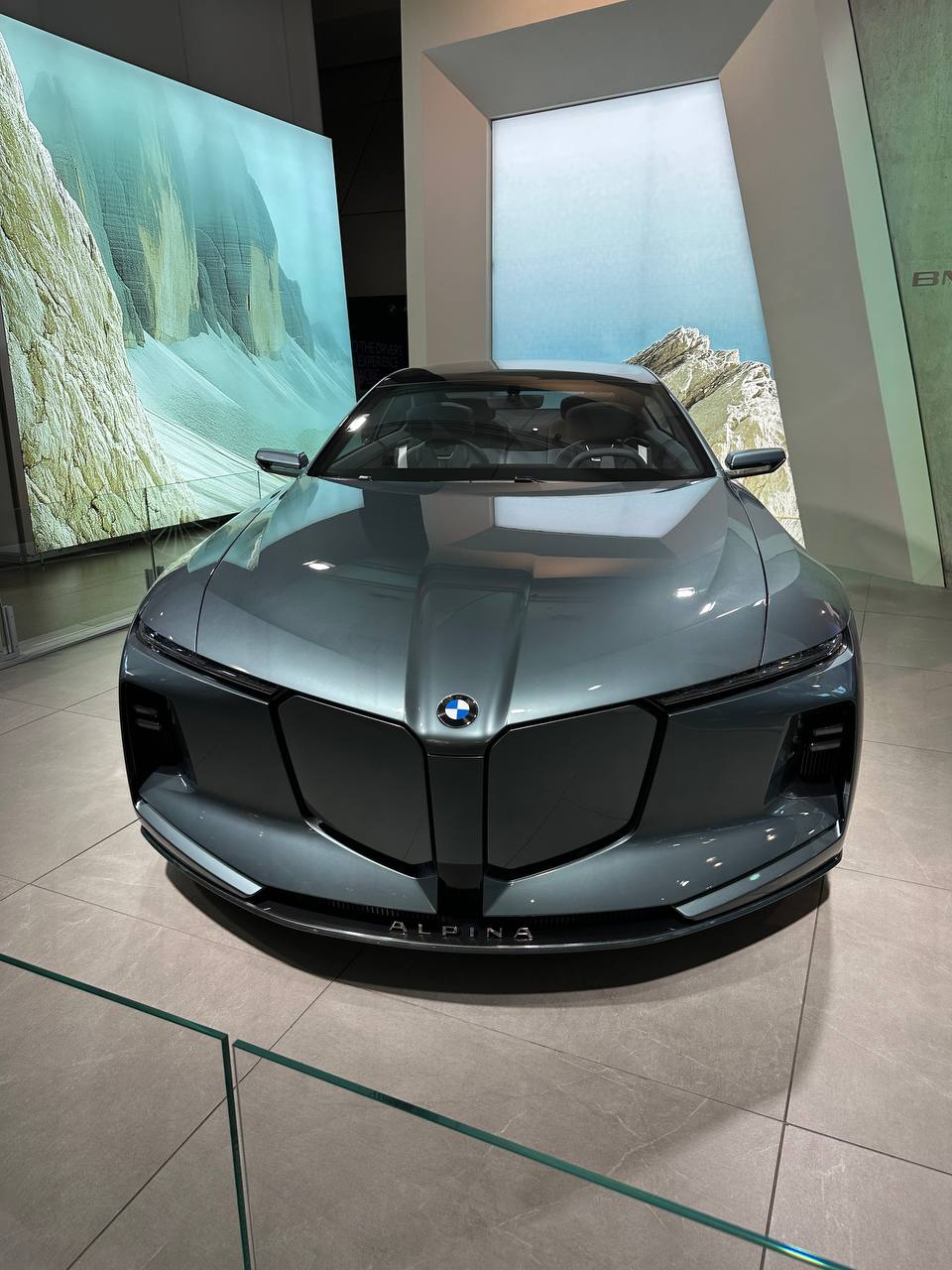 A futuristic Alpina concept car displayed inside BMW Welt.