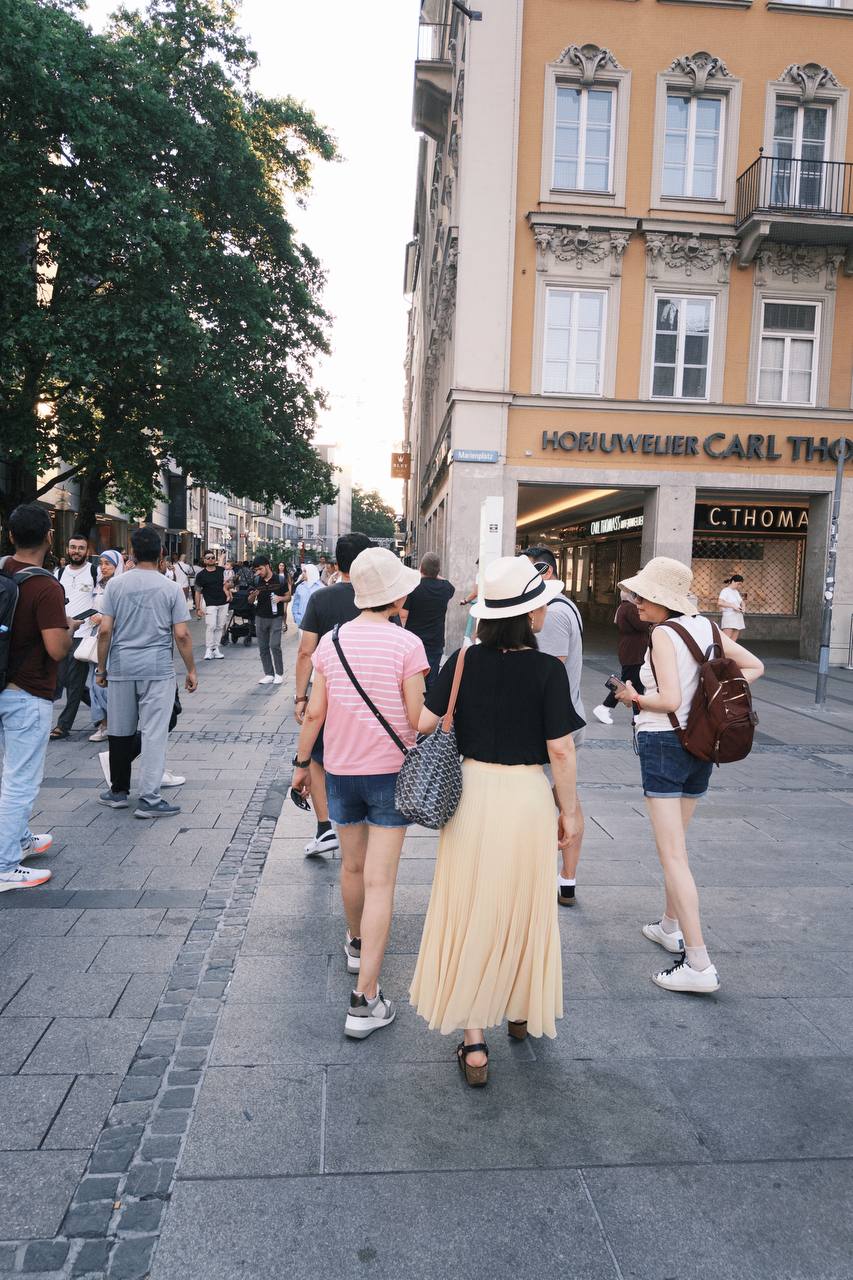 Scenes from Munich Old Town, including historic streets, squares, landmarks, and everyday city moments.