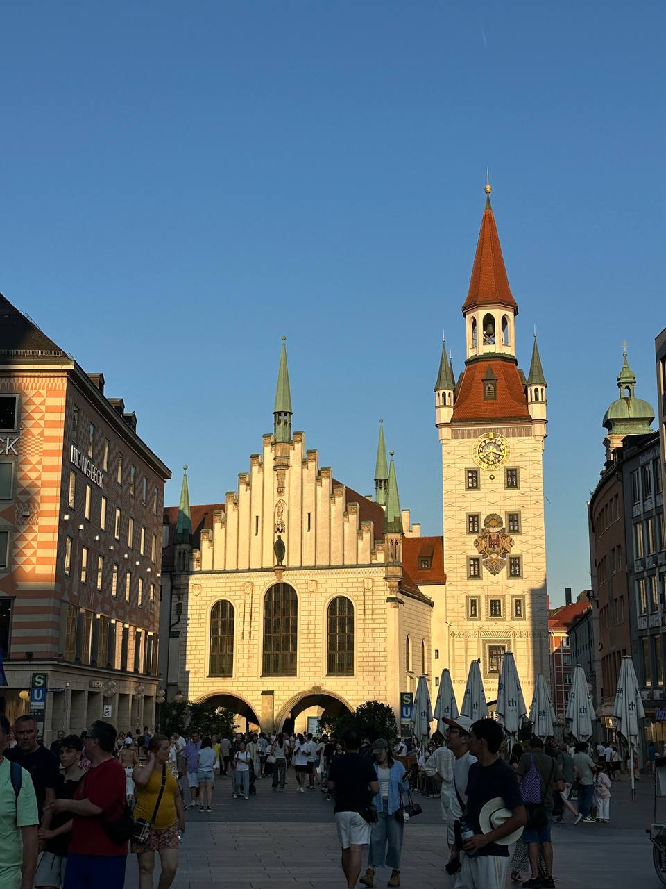 Scenes from Munich Old Town, including historic streets, squares, landmarks, and everyday city moments.