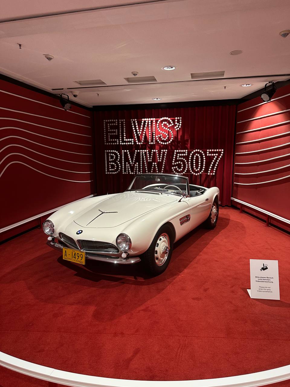 The classic white BMW 507 associated with Elvis, displayed in the museum.